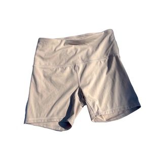small beige shorts and small blue shorts, sold together** good condition